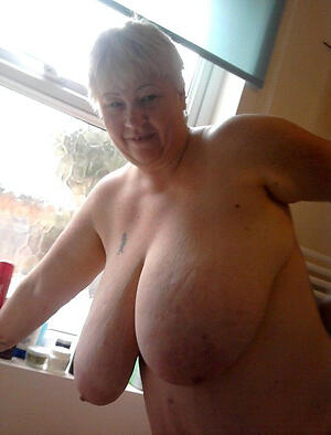 older saggy tits posing nude