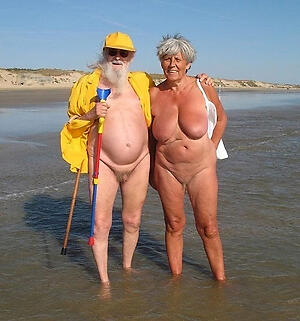 a granny at beach shows us her sexy naked congress