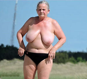 norwegian granny in boxer shorts poses vacant