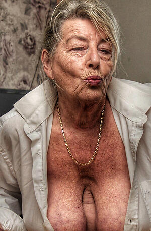 60 year age-old woman poses in the buff