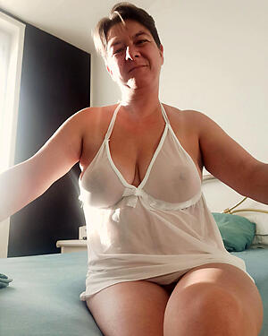 photoshooting with sexy Norwegian older unspecified lingerie